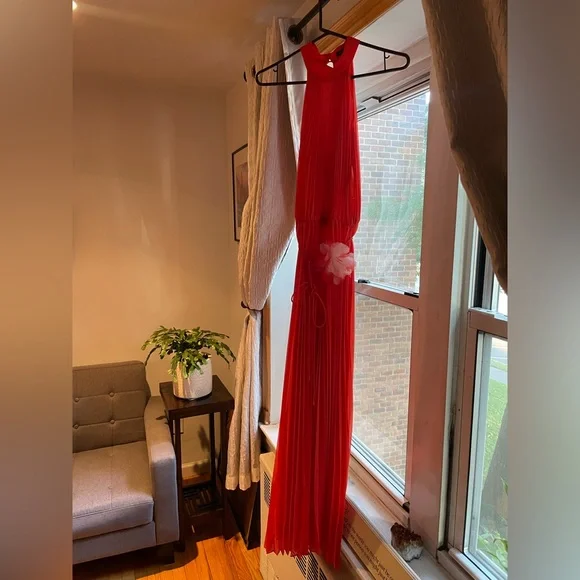 Beautiful vibrant orange high neck jumpsuit
